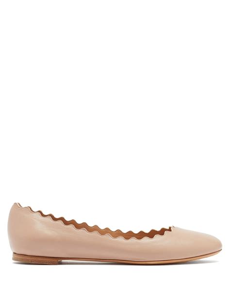 scalloped edge ballet flats.